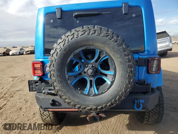 2015 Jeep Wrangler Unlimited Altitude with VIN 1C4BJWEG1FL514848, listed as a Copart auction lot 86474114 with 84,349 mi miles and Salvage title. Bid and sale history available at DreamBid. Image 6.