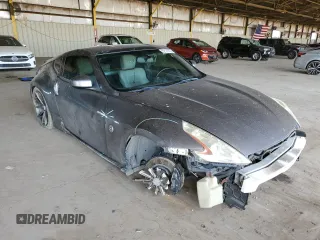2012 Nissan 370Z Touring with VIN JN1AZ4EH9CM564312, listed as a Copart auction lot 52127525 with 134,465 mi miles and Salvage Title. Bid and sale history available at carsss.com. Image 4.
