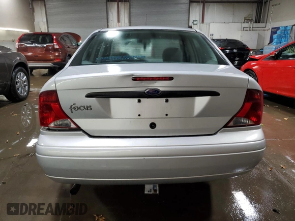 2003 Ford Focus LX z VIN 1FAFP33P03W313279, wystawiony jako Copart lot #89271495 z przebiegiem 152 672 mil mil oraz Szkoda całkowita • Salvage title. Historia ofert i sprzedaży dostępna na DreamBid. Obrazek 6.