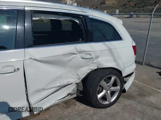2014 Audi Q7 S line Prestige with VIN WA1DGAFE2ED010013, listed as a IAAI auction lot 42454744 with Not provided miles and . Bid and sale history available at DreamBid. Image 17.