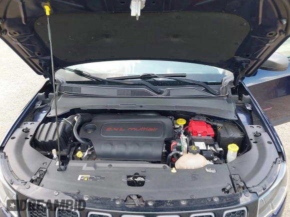 2021 Jeep Compass Trailhawk with VIN 3C4NJDDB0MT590442, listed as a IAAI auction lot 42543530 with 66,669 mi miles and . Bid and sale history available at DreamBid. Image 10.