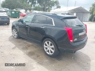 2015 Cadillac SRX Premium Collection with VIN 3GYFNGE30FS634363, listed as a IAAI auction lot 42672064 with 146,821 mi miles and . Bid and sale history available at DreamBid. Image 3.