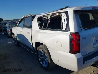 2019 Chevrolet Suburban Premier with VIN 1GNSCJKC0KR293658, listed as a IAAI auction lot 40563834 with 153,619 mi miles. Bid and sale history available at carsss.com. Image 14.