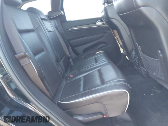 2018 Jeep Grand Cherokee High Altitude with VIN 1C4RJFCT6JC102660, listed as a IAAI auction lot 41752965 with 119,841 mi miles. Bid and sale history available at carsss.com. Image 8.