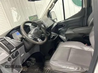 2016 Ford Transit Cargo with VIN 1FTYE2YM3GKB01846, listed as a IAAI auction lot 42043308 with 164,802 mi miles. Bid and sale history available at carsss.com. Image 1.