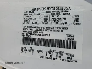 2002 Ford F-150 XL with VIN 1FTRX07W52KB08618, listed as a Copart auction lot 57941974 with 172,843 mi miles and Salvage title. Bid and sale history available at DreamBid. Image 12.