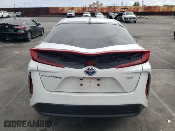 2021 Toyota Prius LE with VIN JTDKAMFP4M3192707, listed as a Copart auction lot 55993185 with 44,909 mi miles and Salvage Title. Bid and sale history available at DreamBid. Image 6.