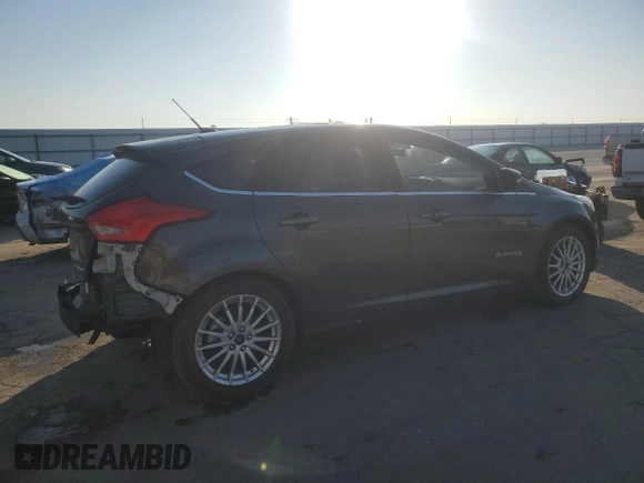 2015 Ford Focus Electric z VIN 1FADP3R44FL221828, wystawiony jako Copart lot #43067325 z przebiegiem 55 636 mil mil oraz Szkoda całkowita • Salvage title. Historia ofert i sprzedaży dostępna na DreamBid. Obrazek 3.