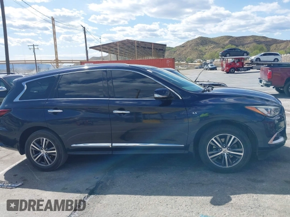 2016 Infiniti QX60 with VIN 5N1AL0MNXGC520860, listed as a IAAI auction lot 41955662 with 165,716 mi miles. Bid and sale history available at carsss.com. Image 13.