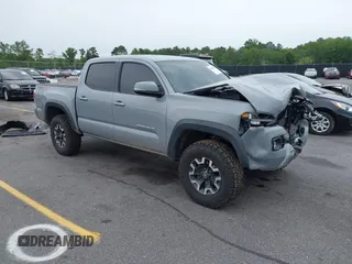 2020 Toyota Tacoma SR5 with VIN 3TYCZ5AN1LT005059, listed as a IAAI auction lot 42189390 with 60,514 mi miles and . Bid and sale history available at DreamBid. Image 1.