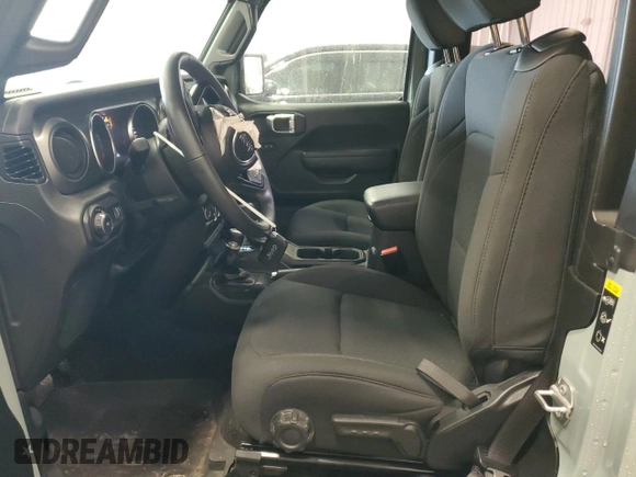 2023 Jeep Wrangler Sport with VIN 1C4HJXAG7PW617021, listed as a Copart auction lot 59928305 with 8,503 mi miles and Salvage title. Bid and sale history available at DreamBid. Image 7.