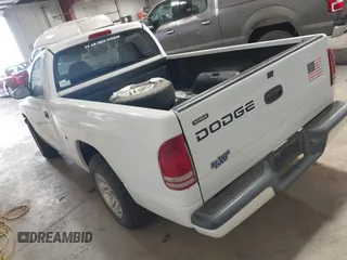 2001 Dodge Dakota with VIN 1B7FL26XX1S304511, listed as a IAAI auction lot 41246101 with 117,457 mi miles. Bid and sale history available at carsss.com. Image 3.