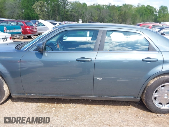 2005 Chrysler 300 with VIN 2C3AA53G35H157083, listed as a IAAI auction lot 41945392 with 192,215 mi miles. Bid and sale history available at carsss.com. Image 14.