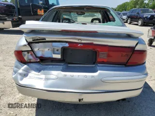 2002 Buick Regal LS z VIN 2G4WB55KX21144458, wystawiony jako Copart lot #54374445 z przebiegiem 97 900 mil mil oraz Czysty tytuł • Clean title. Historia ofert i sprzedaży dostępna na DreamBid. Obrazek 6.