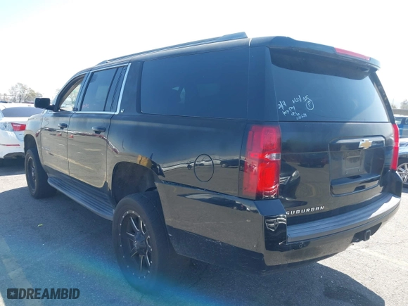 2015 Chevrolet Suburban LT with VIN 1GNSCJKC2FR281629, listed as a IAAI auction lot 41849300 with 133,842 mi miles. Bid and sale history available at carsss.com. Image 6.