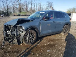 2023 Mazda CX-5 S Carbon Edition z VIN JM3KFBCM0P0133683, wystawiony jako Copart lot #51155165 z przebiegiem 38 494 mil mil oraz Szkoda całkowita • Salvage title. Historia ofert i sprzedaży dostępna na DreamBid. Obrazek 1.