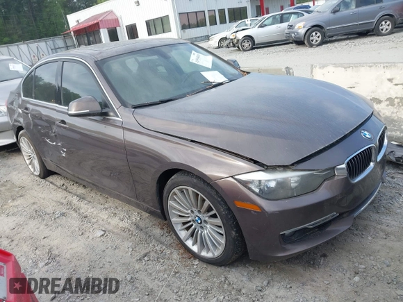 2012 BMW 3 Series 328i with VIN WBA3A5C5XCF349888, listed as a IAAI auction lot 41954810 with 163,070 mi miles. Bid and sale history available at carsss.com. Image 1.