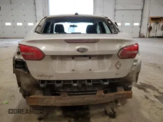 2018 Ford Focus SE z VIN 1FADP3F24JL315154, wystawiony jako Copart lot #53609185 z przebiegiem 76 216 mil mil oraz Szkoda całkowita • Salvage title. Historia ofert i sprzedaży dostępna na DreamBid. Obrazek 6.
