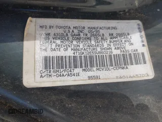 1995 Toyota Camry LE with VIN 4T1GK12E5SU860216, listed as a IAAI auction lot 41803933 with 235,130 mi miles. Bid and sale history available at carsss.com. Image 9.
