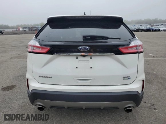 2020 Ford Edge SEL z VIN 2FMPK4J9XLBB30184, wystawiony jako Copart lot #56839925 z przebiegiem 38 563 mil mil oraz Szkoda całkowita • Salvage title. Historia ofert i sprzedaży dostępna na DreamBid. Obrazek 6.