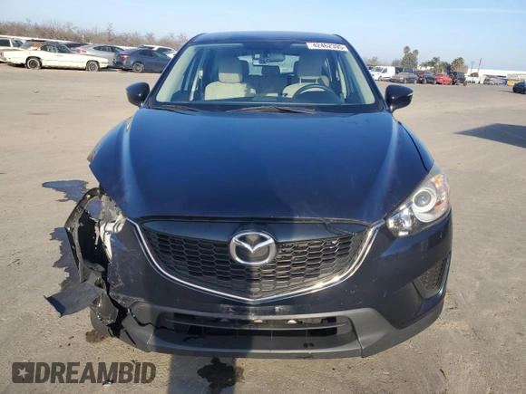 2015 Mazda CX-5 Sport z VIN JM3KE2BE6F0491107, wystawiony jako Copart lot #42462395 z przebiegiem 82 528 mil mil oraz Szkoda całkowita • Salvage title. Historia ofert i sprzedaży dostępna na DreamBid. Obrazek 5.
