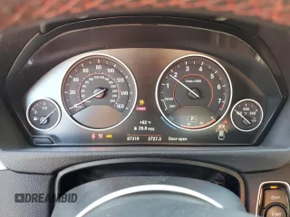 2016 BMW 4 Series 428i z VIN WBA4A9C59GG696298, wystawiony jako Copart lot #52348325 z przebiegiem 87 319 mil mil oraz Szkoda całkowita • Salvage title. Historia ofert i sprzedaży dostępna na DreamBid. Obrazek 9.