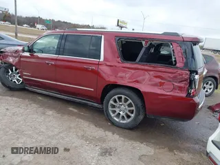 2016 GMC Yukon XL Denali with VIN 1GKS1HKJXGR453840, listed as a IAAI auction lot 41057135 with 105,469 mi miles. Bid and sale history available at carsss.com. Image 3.