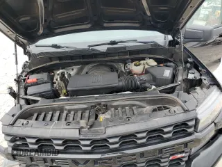 2021 Chevrolet Silverado 1500 Custom Trail Boss with VIN 1GCPYCEF5MZ296592, listed as a Copart auction lot 50968655 with 60,010 mi miles and Salvage Title. Bid and sale history available at DreamBid. Image 13.