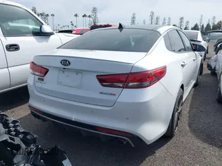 2016 Kia Optima SX Turbo with VIN 5XXGW4L23GG027090, listed as a IAAI auction lot 42172497 with 150,426 mi miles and . Bid and sale history available at DreamBid. Image 4.