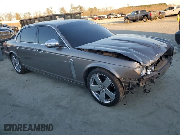2008 Jaguar XJ Vanden Plas with VIN SAJWA82B18SH28807, listed as a Copart auction lot 42571155 with 97,548 mi miles and Salvage Title. Bid and sale history available at carsss.com. Image 4.