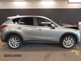 2014 Mazda CX-5 Grand Touring with VIN JM3KE4DY9E0373974, listed as a IAAI auction lot 42073693 with 86,755 mi miles. Bid and sale history available at carsss.com. Image 13.