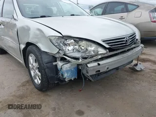 2005 Toyota Camry LE with VIN JTDBF30K650163057, listed as a IAAI auction lot 41730270 with 98,300 mi miles and . Bid and sale history available at DreamBid. Image 6.