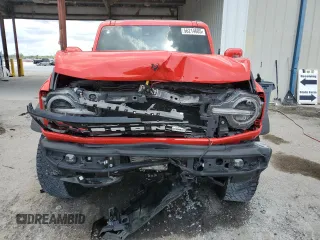 2022 Ford Bronco с VIN 1FMEE5DP9NLB49973, выставлен на аукционе Copart как лот 56214605 с пробегом 23 697 миль миль и Списание • Salvage title. История ставок и продаж доступна на DreamBid. Изображение 5.