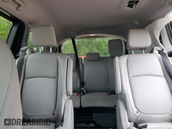 2023 Honda Odyssey Touring with VIN 5FNRL6H86PB024066, listed as a Copart auction lot 58414575 with 29,827 mi miles and Salvage title. Bid and sale history available at DreamBid. Image 10.