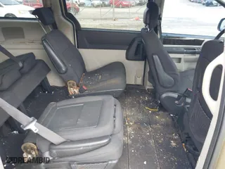 2010 Dodge Grand Caravan SXT with VIN 2D4RN5DX5AR290131, listed as a IAAI auction lot 41314452 with 194,819 mi miles. Bid and sale history available at carsss.com. Image 8.