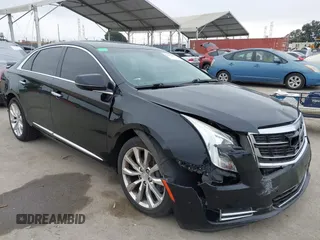 2017 Cadillac XTS Luxury with VIN 2G61M5S34H9112575, listed as a IAAI auction lot 42570673 with 97,828 mi miles and . Bid and sale history available at DreamBid. Image 1.