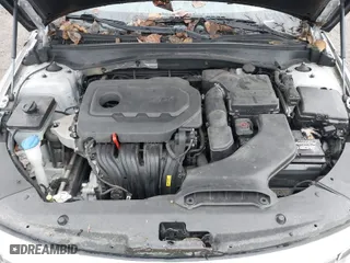 2016 Kia Optima LX with VIN 5XXGT4L31GG047355, listed as a IAAI auction lot 41657204 with 116,989 mi miles. Bid and sale history available at carsss.com. Image 10.
