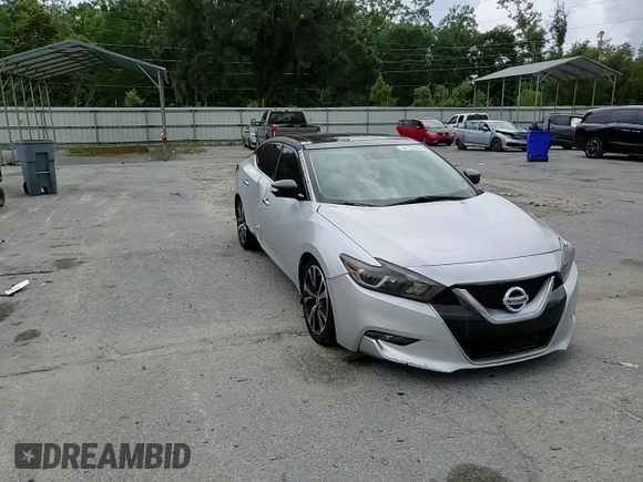 2017 Nissan Maxima Platinum with VIN 1N4AA6AP9HC387387, listed as a Copart auction lot 58727605 with 335,186 mi miles and Salvage title. Bid and sale history available at DreamBid. Image 14.