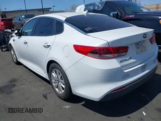 2016 Kia Optima LX with VIN 5XXGT4L37GG121295, listed as a IAAI auction lot 41922348 with 82,238 mi miles. Bid and sale history available at carsss.com. Image 3.