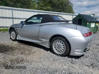 1996 Alfa Romeo Spider z VIN ZAR91600006013048, wystawiony jako Copart lot #62495174 z przebiegiem 143 888 mil mil oraz Szkody całkowita. Historia ofert i sprzedaży dostępna na DreamBid. Obrazek 2.