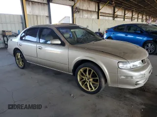 1998 Nissan Maxima GXE с VIN JN1CA21DXWT527738, выставлен на аукционе Copart как лот 57276725 с пробегом 109 453 миль миль и Списание • Salvage title. История ставок и продаж доступна на DreamBid. Изображение 4.