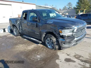 2019 Ram 1500 Laramie with VIN 1C6SRFDTXKN860913, listed as a IAAI auction lot 41356687 with 199,485 mi miles. Bid and sale history available at carsss.com. Image 1.