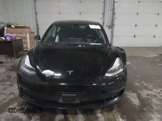 2018 Tesla Model 3 Long Range Battery with VIN 5YJ3E1EB7JF086778, listed as a IAAI auction lot 41348008 with 74,491 mi miles and . Bid and sale history available at DreamBid. Image 12.