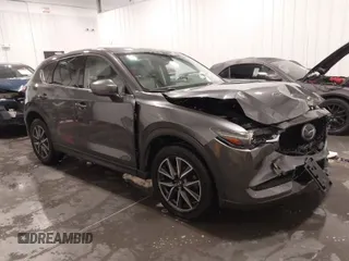 2017 Mazda CX-5 Grand Touring with VIN JM3KFADLXH0151593, listed as a IAAI auction lot 41823378 with 149,299 mi miles. Bid and sale history available at carsss.com. Image 1.