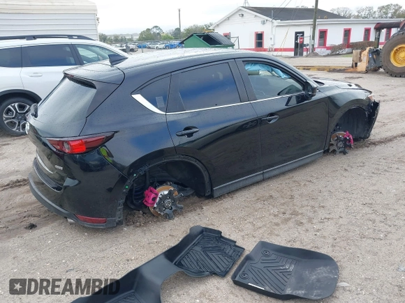 2019 Mazda CX-5 Touring with VIN JM3KFACM0K0692007, listed as a IAAI auction lot 41645657 with 1 mi miles. Bid and sale history available at carsss.com. Image 4.