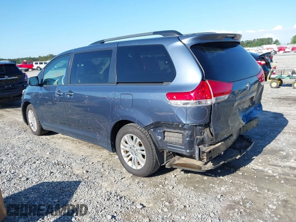 2014 Toyota Sienna XLE with VIN 5TDYK3DC9ES526117, listed as a IAAI auction lot 42247546 with 119,096 mi miles and . Bid and sale history available at DreamBid. Image 3.
