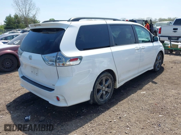 2017 Toyota Sienna SE with VIN 5TDXZ3DCXHS883219, listed as a IAAI auction lot 42104502 with 97,047 mi miles and . Bid and sale history available at DreamBid. Image 4.