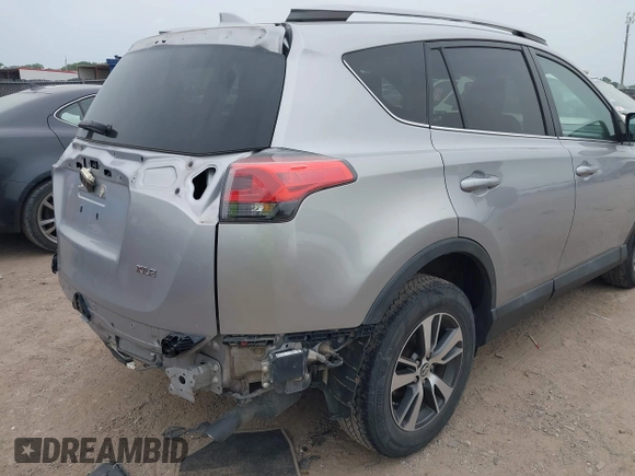2018 Toyota RAV4 XLE с VIN 2T3WFREV0JW409842, выставлен на аукционе IAAI как лот 42057521 с пробегом 145 915 миль миль и . История ставок и продаж доступна на DreamBid. Изображение 17.
