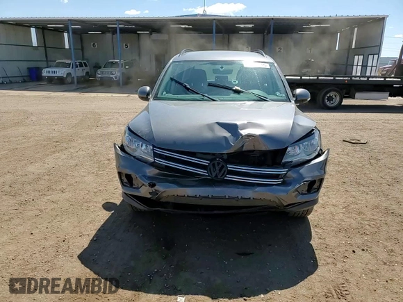 2017 Volkswagen Tiguan S with VIN WVGBV7AX6HK046412, listed as a Copart auction lot 57404245 with 75,881 mi miles and Salvage title. Bid and sale history available at DreamBid. Image 14.