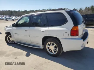2006 GMC Envoy Denali with VIN 1GKET63M762190296, listed as a Copart auction lot 46691595 with 128,985 mi miles and Salvage Title. Bid and sale history available at carsss.com. Image 2.